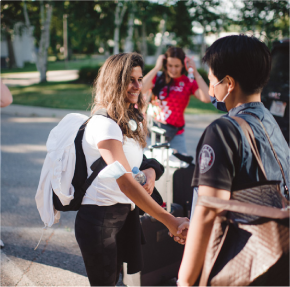 g-4 women talking outside